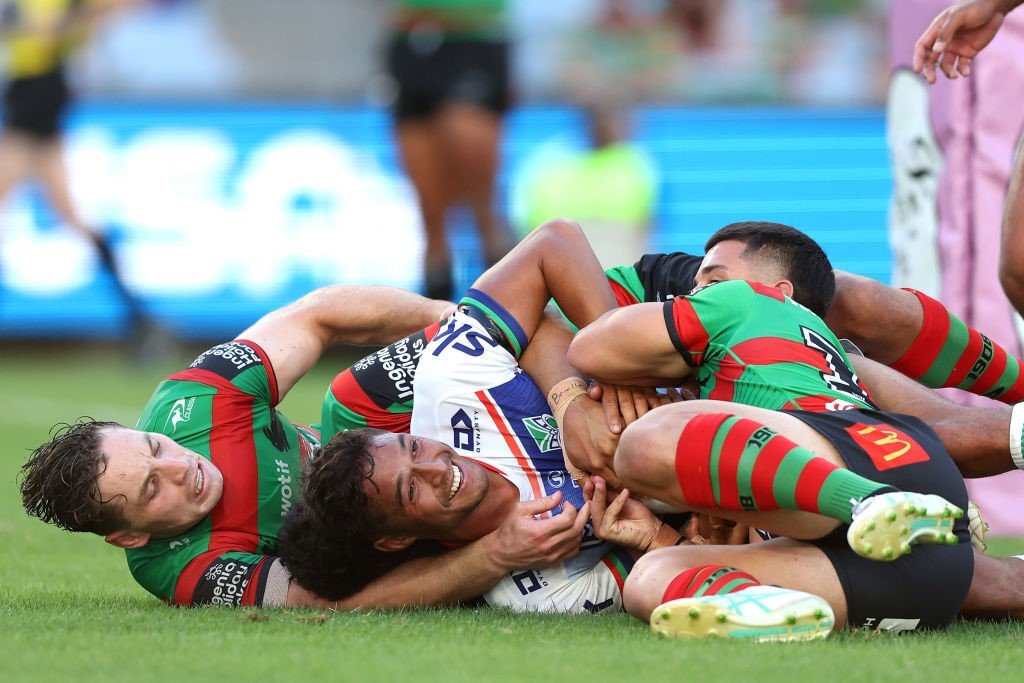 Te Maire Martin smiles as he scores a try against the South Sydney Rabbitohs.