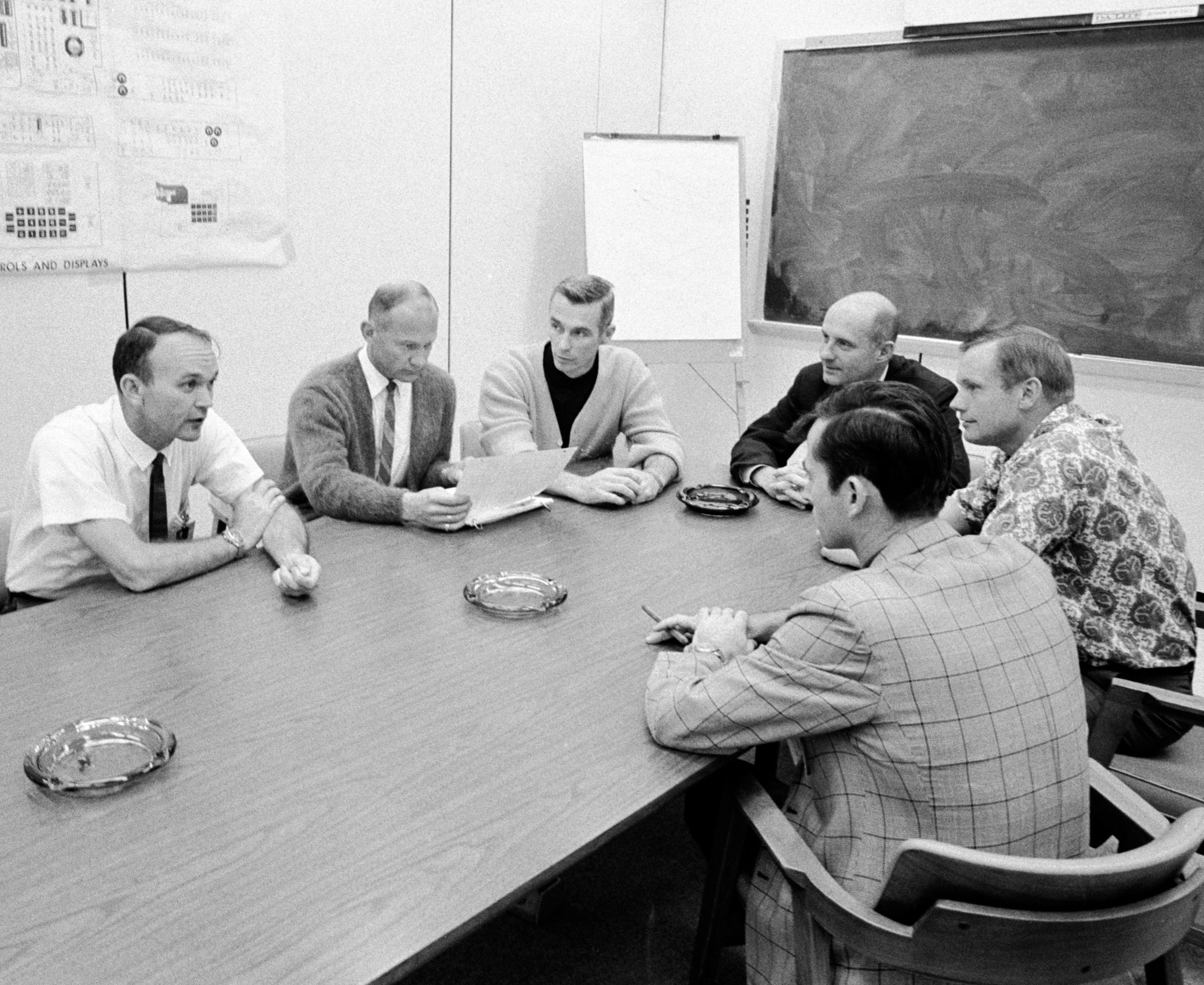 Apollo 10 astronauts debrief their mission with the Apollo 11 astronauts