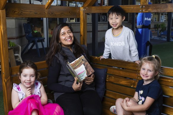 Flemington Goodstart Early Learning Centre director Mousumi Chowdhury with kinder kids (from left) Estelle, 4, Lucas, 4 and Victoria, 4.