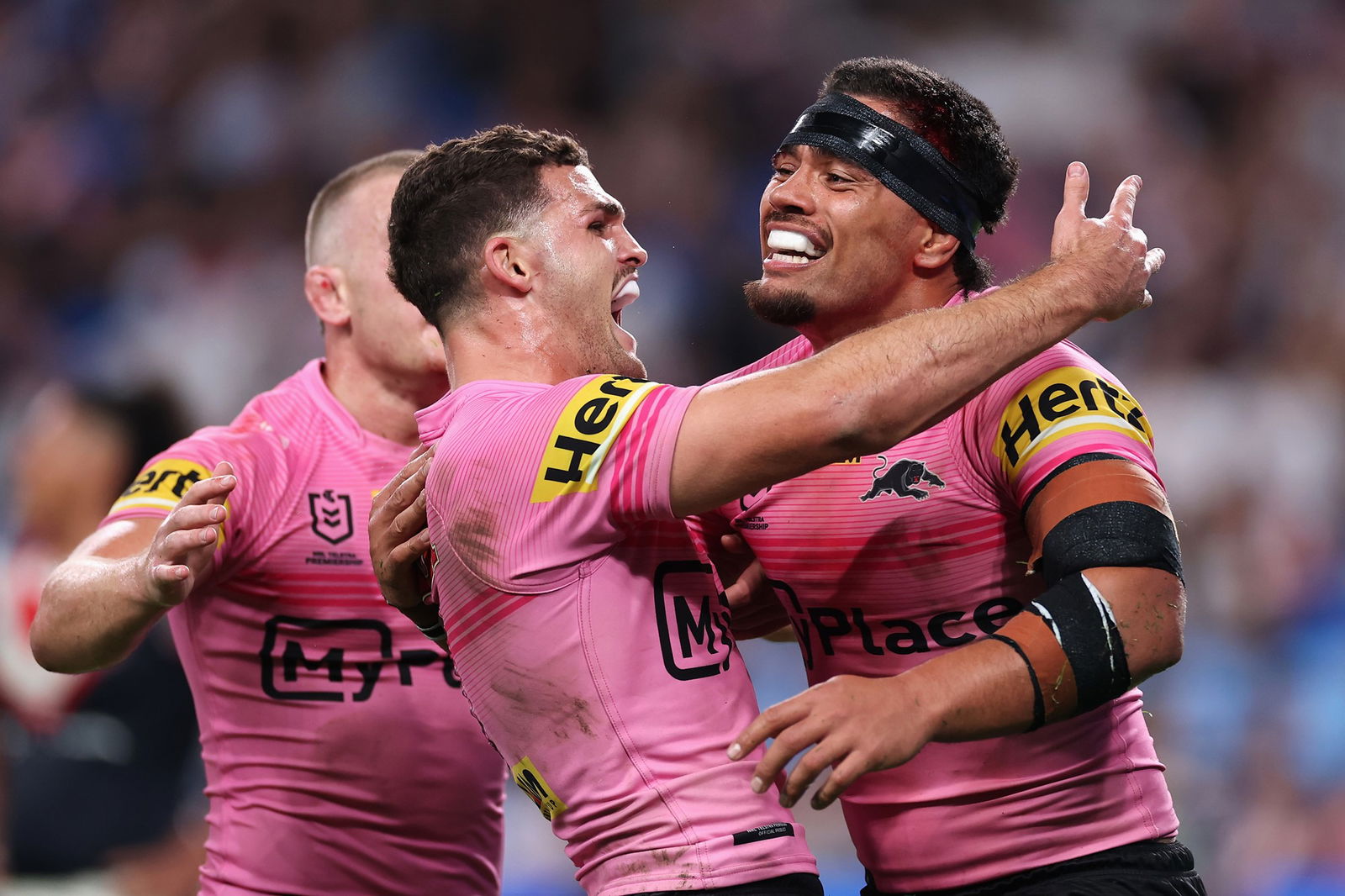 Nathan Cleary celebrates a try with Isaiah Papali'i.