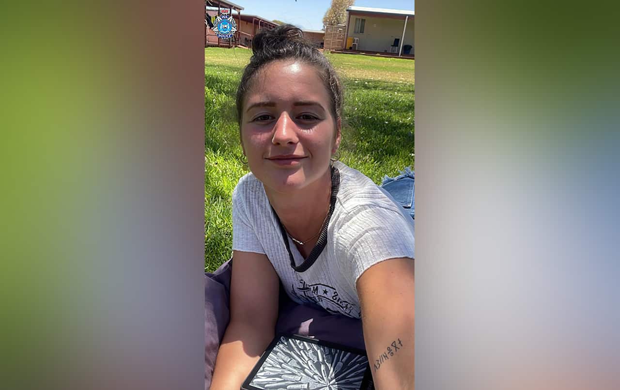 A woman smiling in a photo.