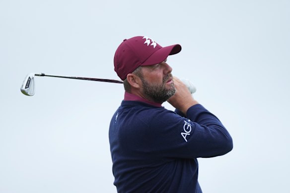 Marc Leishman plays his tee shot on the 13th hole during the second round of the British Open golf championship at the Royal Portrush Golf Club, Northern Ireland, on Friday.