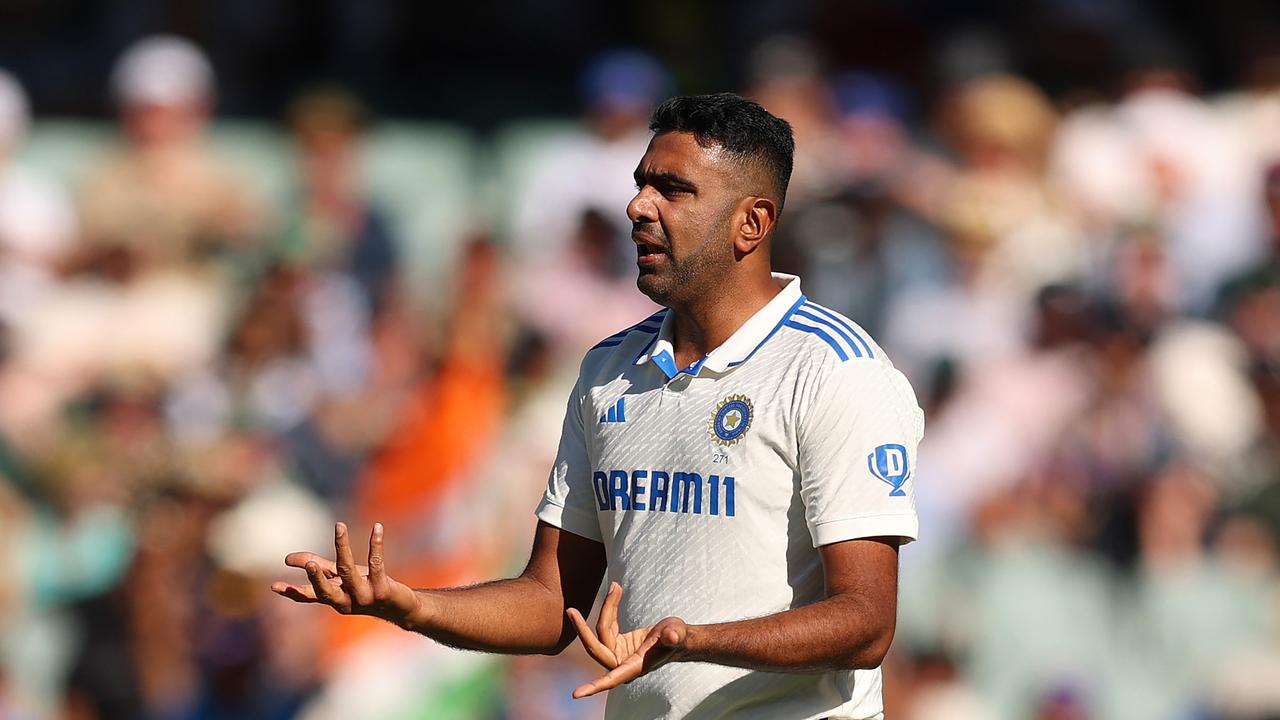 ADELAIDE, AUSTRALIA - DECEMBER 07: Ravichandran Ashwin of India reacts after dismissing Mitch Marsh of Australia during day two of the Men's Test Match series between Australia and India at Adelaide Oval on December 07, 2024 in Adelaide, Australia. (Photo by Robert Cianflone/Getty Images)