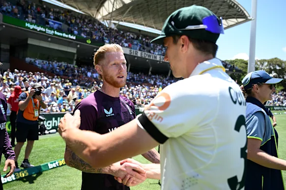 Tough times: England captain Ben Stokes shakes hands with Pat Cummins.