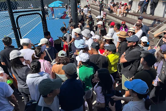Fans rush to meet Alexandra Eala at the end of her practice session on Sunday.