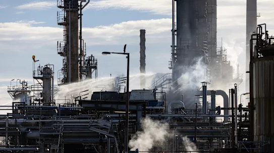 Efforts to extinguish the blaze at the Geelong refinery.