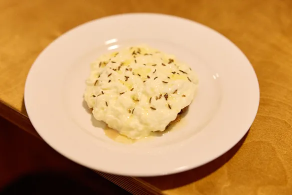 Stracciatella, celeriac, quince and pecan vinaigrette.