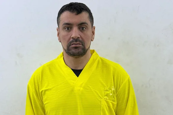 Kaz Hamad in custody in Iraq.