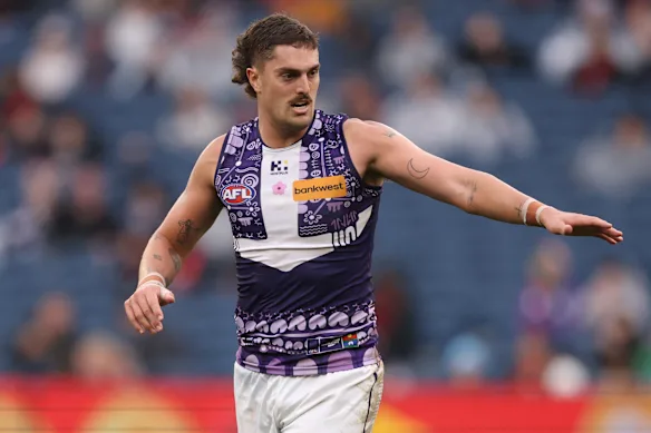 Luke Jackson of the Dockers celebrates after scoring a goal in round 10.