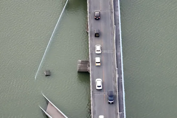 An  aerial image shows part of a bridge that collapsed after the earthquake in Yatsushiro, Kumamoto prefecture, southern Japan.