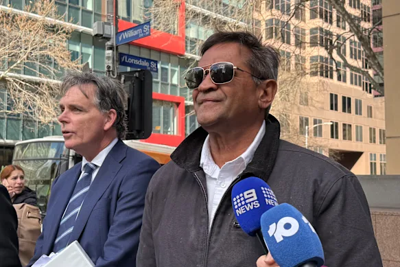 Former AFL player Nicky Winmar outside court.