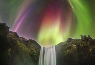 APOD: 2026 August 27 – Colorful Aurora over an Icelandic Waterfall