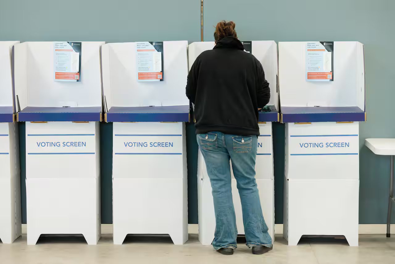 A person voting at polling booth