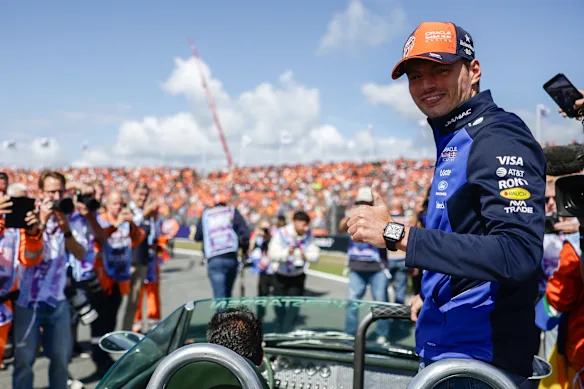 Max Verstappen is all smiles after re-signing with Red Bull.