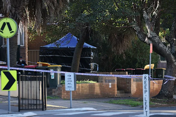 Police cordoned off Harrow Road, Auburn, following the grim discovery.