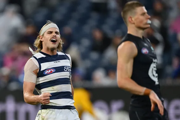 Bailey Smith celebrates on the siren after the Cats knocked the Blues out of the finals race.