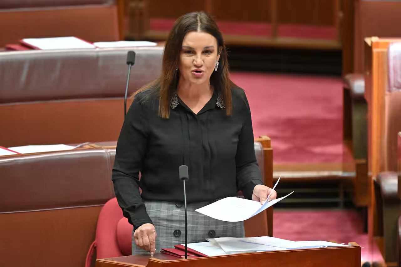 Jacqui Lambie speaking into a microphone in the Australian federal Senate.