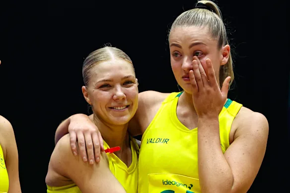 Australian teammates Kate Moloney and Sophie Dwyer console each other after the Diamonds won the bronze medal at the Glasgow Commonwealth Games.